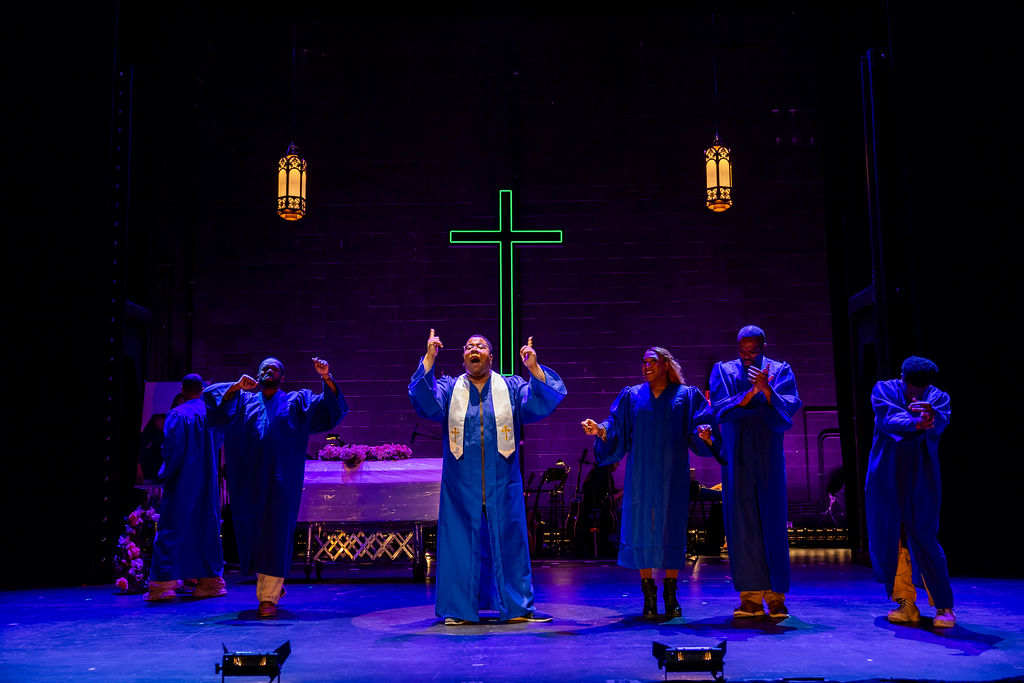 Kai Clifton (center) and the company of "A Strange Loop."