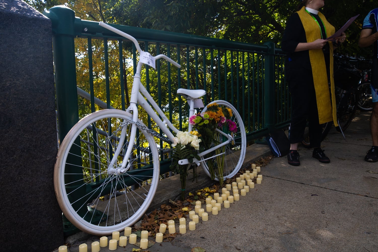 A white 'ghost bike' near the site where John H. Corcoran '84 was killed last September while riding an e-bike. The driver who fatally struck Corcoran pleaded not guilty to vehicular homicide and negligence at a hearing on Monday.