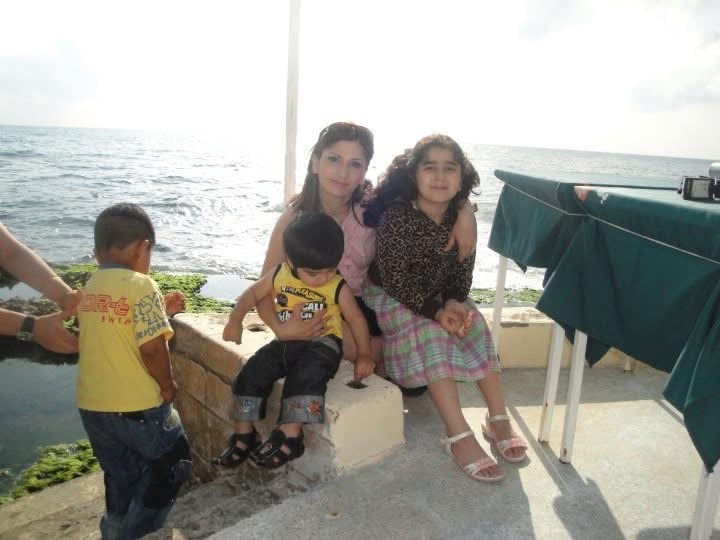 The author with her mother and brother on a trip to the Syrian coast in 2010.