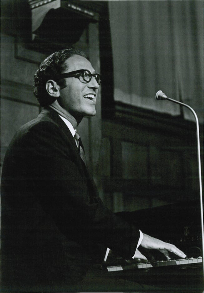 Thomas A. Lehrer '47 performs at a 1967 show in Copenhagen. Lehrer died in late July at age 97.