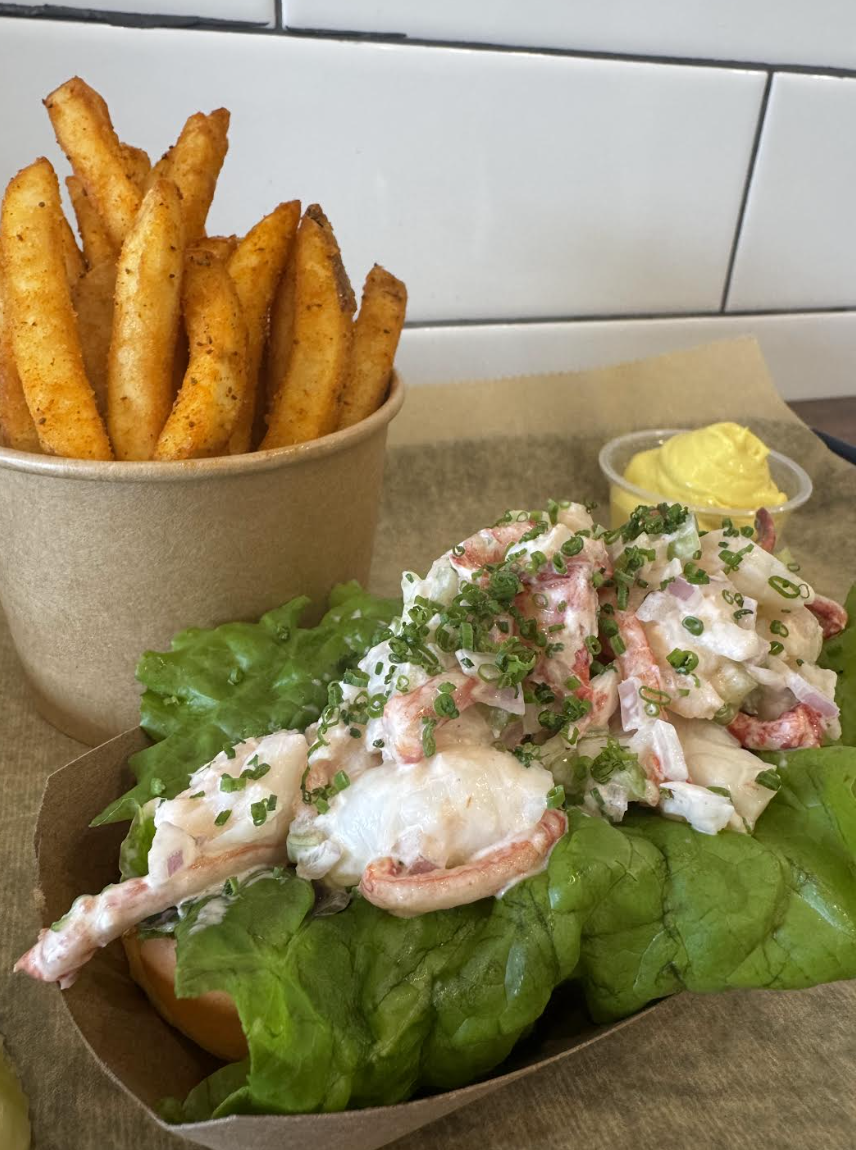 The cold lobster bisque roll arrives generously filled.