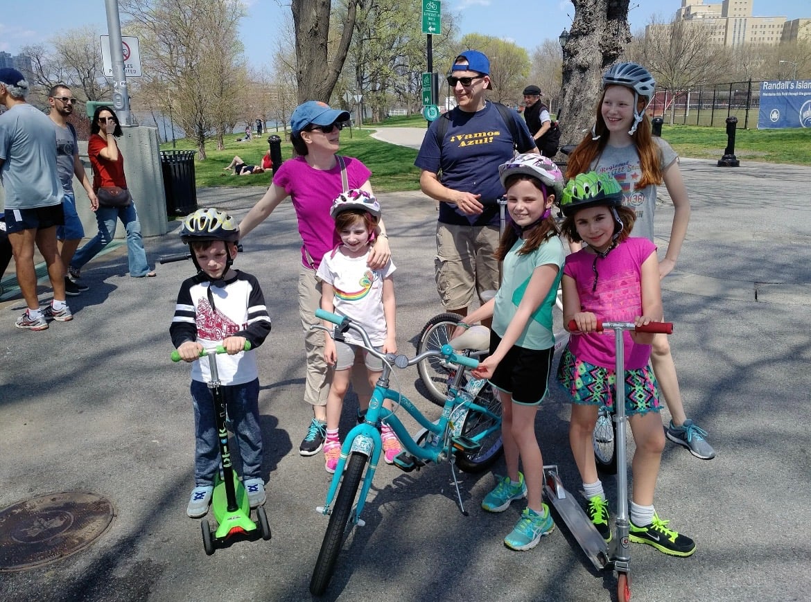 Leah E. Riegel (center, with the bike) sporting micromobility with her friends and family circa 2017.